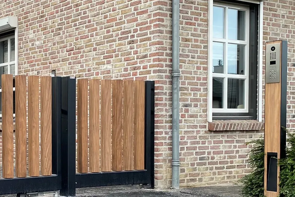 Directory entry panel serving a multi-unit slat-fenced property