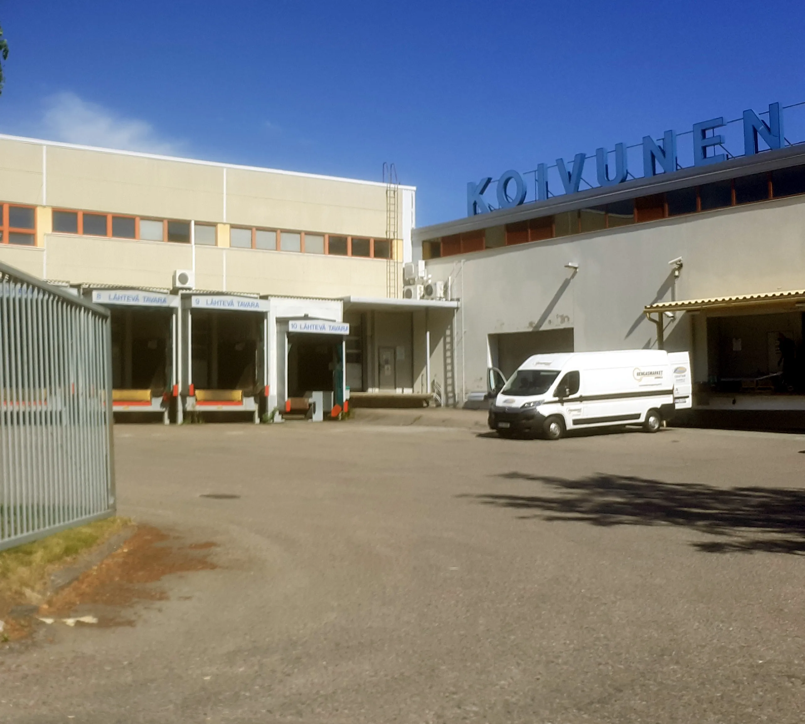 Warehouse loading dock and truck gate